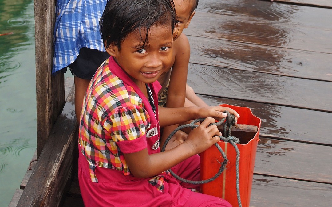 A little girl in the sea nomad village, Mantigola, in Sulawesi.